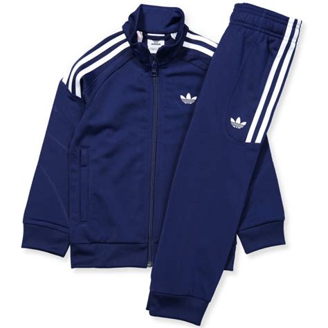 dark blue adidas tracksuit.